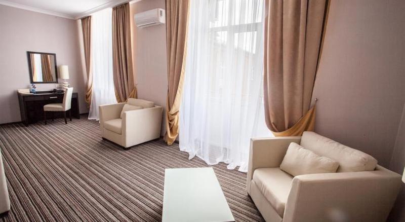 Hotel Optima Sumy Habitación foto